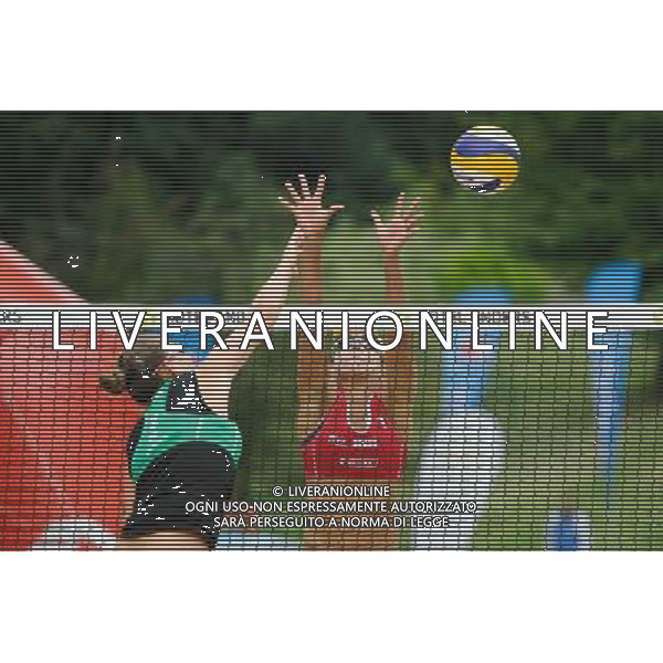 21.08.2014 - Stare Jablonki , siatkowka plazowa , beach volleyball , World Tour , FIVB Stare Jablonki Grand Slam 2014 , Brazylia (czerwone) - Wlochy (zielone) , Brazil (red) - Italy (green) N/Z Viktoria Orsi Toth , Juliana Felisberta Da Silva Fot. Karol Bartnik / MPAimages.com/NEWSPIX.PL --- Newspix.pl /Agenzia Aldo Liverani sas - ITALY ONLY - Brasile - Italia beach volley femminile, World Tour, FIVB Stare Jablonki Grande Slam 2014 *** Local Caption *** www.newspix.pl mail us: info@newspix.pl call us: 0048 022 23 22 222 --- Polish Picture Agency by Ringier Axel Springer Poland