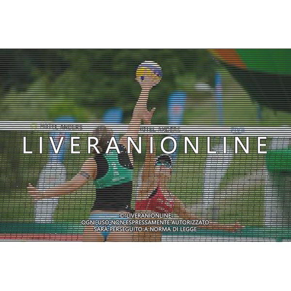 21.08.2014 - Stare Jablonki , siatkowka plazowa , beach volleyball , World Tour , FIVB Stare Jablonki Grand Slam 2014 , Brazylia (czerwone) - Wlochy (zielone) , Brazil (red) - Italy (green) N/Z Viktoria Orsi Toth , Maria Antonelli Fot. Karol Bartnik / MPAimages.com/NEWSPIX.PL --- Newspix.pl /Agenzia Aldo Liverani sas - ITALY ONLY - Brasile - Italia beach volley femminile, World Tour, FIVB Stare Jablonki Grande Slam 2014 *** Local Caption *** www.newspix.pl mail us: info@newspix.pl call us: 0048 022 23 22 222 --- Polish Picture Agency by Ringier Axel Springer Poland