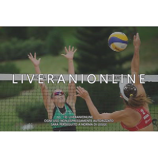 21.08.2014 - Stare Jablonki , siatkowka plazowa , beach volleyball , World Tour , FIVB Stare Jablonki Grand Slam 2014 , Brazylia (czerwone) - Wlochy (zielone) , Brazil (red) - Italy (green) N/Z Viktoria Orsi Toth , Maria Antonelli Fot. Karol Bartnik / MPAimages.com/NEWSPIX.PL --- Newspix.pl /Agenzia Aldo Liverani sas - ITALY ONLY - Brasile - Italia beach volley femminile, World Tour, FIVB Stare Jablonki Grande Slam 2014 *** Local Caption *** www.newspix.pl mail us: info@newspix.pl call us: 0048 022 23 22 222 --- Polish Picture Agency by Ringier Axel Springer Poland