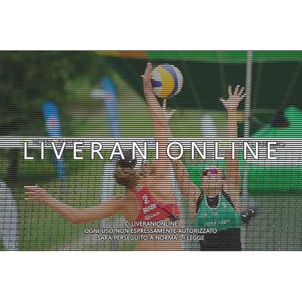 21.08.2014 - Stare Jablonki , siatkowka plazowa , beach volleyball , World Tour , FIVB Stare Jablonki Grand Slam 2014 , Brazylia (czerwone) - Wlochy (zielone) , Brazil (red) - Italy (green) N/Z Maria Antonelli , Viktoria Orsi Toth Fot. Karol Bartnik / MPAimages.com/NEWSPIX.PL --- Newspix.pl /Agenzia Aldo Liverani sas - ITALY ONLY - Brasile - Italia beach volley femminile, World Tour, FIVB Stare Jablonki Grande Slam 2014 *** Local Caption *** www.newspix.pl mail us: info@newspix.pl call us: 0048 022 23 22 222 --- Polish Picture Agency by Ringier Axel Springer Poland