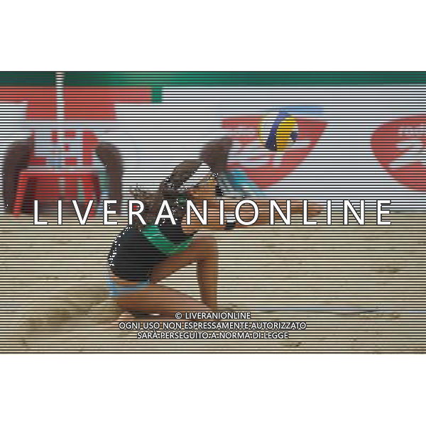 21.08.2014 - Stare Jablonki , siatkowka plazowa , beach volleyball , World Tour , FIVB Stare Jablonki Grand Slam 2014 , Brazylia (czerwone) - Wlochy (zielone) , Brazil (red) - Italy (green) N/Z Marta Menegatti Fot. Karol Bartnik / MPAimages.com/NEWSPIX.PL --- Newspix.pl /Agenzia Aldo Liverani sas - ITALY ONLY - Brasile - Italia beach volley femminile, World Tour, FIVB Stare Jablonki Grande Slam 2014 *** Local Caption *** www.newspix.pl mail us: info@newspix.pl call us: 0048 022 23 22 222 --- Polish Picture Agency by Ringier Axel Springer Poland