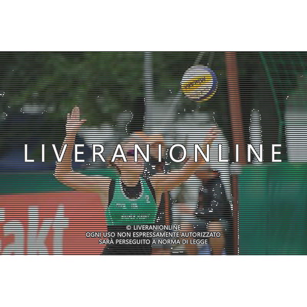 21.08.2014 - Stare Jablonki , siatkowka plazowa , beach volleyball , World Tour , FIVB Stare Jablonki Grand Slam 2014 , Brazylia (czerwone) - Wlochy (zielone) , Brazil (red) - Italy (green) N/Z Viktoria Orsi Toth Fot. Karol Bartnik / MPAimages.com/NEWSPIX.PL --- Newspix.pl /Agenzia Aldo Liverani sas - ITALY ONLY - Brasile - Italia beach volley femminile, World Tour, FIVB Stare Jablonki Grande Slam 2014 *** Local Caption *** www.newspix.pl mail us: info@newspix.pl call us: 0048 022 23 22 222 --- Polish Picture Agency by Ringier Axel Springer Poland