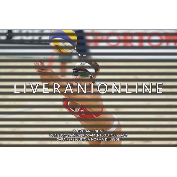 21.08.2014 - Stare Jablonki , siatkowka plazowa , beach volleyball , World Tour , FIVB Stare Jablonki Grand Slam 2014 , Brazylia (czerwone) - Wlochy (zielone) , Brazil (red) - Italy (green) N/Z Maria Antonelli Fot. Karol Bartnik / MPAimages.com/NEWSPIX.PL --- Newspix.pl /Agenzia Aldo Liverani sas - ITALY ONLY - Brasile - Italia beach volley femminile, World Tour, FIVB Stare Jablonki Grande Slam 2014 *** Local Caption *** www.newspix.pl mail us: info@newspix.pl call us: 0048 022 23 22 222 --- Polish Picture Agency by Ringier Axel Springer Poland
