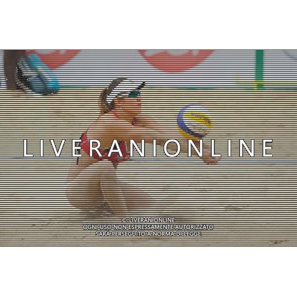 21.08.2014 - Stare Jablonki , siatkowka plazowa , beach volleyball , World Tour , FIVB Stare Jablonki Grand Slam 2014 , Brazylia (czerwone) - Wlochy (zielone) , Brazil (red) - Italy (green) N/Z Maria Antonelli Fot. Karol Bartnik / MPAimages.com/NEWSPIX.PL --- Newspix.pl /Agenzia Aldo Liverani sas - ITALY ONLY - Brasile - Italia beach volley femminile, World Tour, FIVB Stare Jablonki Grande Slam 2014 *** Local Caption *** www.newspix.pl mail us: info@newspix.pl call us: 0048 022 23 22 222 --- Polish Picture Agency by Ringier Axel Springer Poland