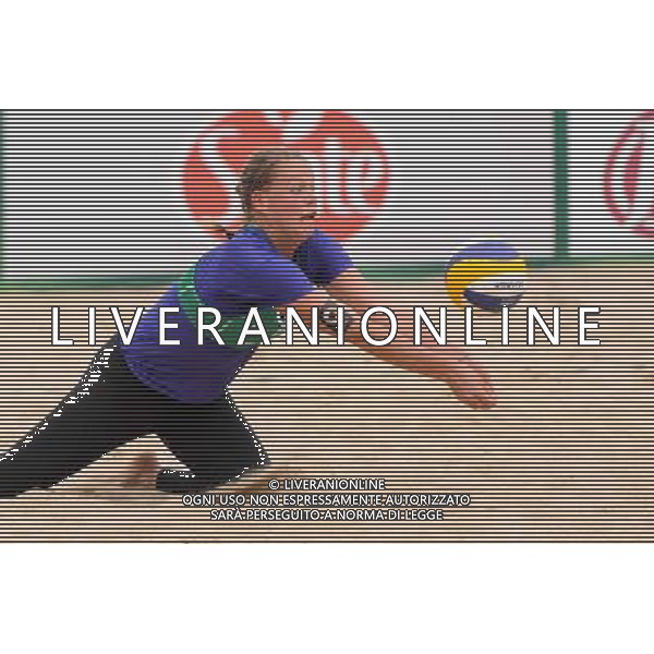 21.08.2014 - Stare Jablonki , siatkowka plazowa , beach volleyball , World Tour , FIVB Stare Jablonki Grand Slam 2014 , Niemcy (zielone) - Polska (czerwone) , Germany - Poland N/Z Britta Buthe Fot. Mariusz Palczynski / MPAimages.com/NEWSPIX.PL --- Newspix.pl /Agenzia Aldo Liverani sas - ITALY ONLY - Germania - Polonia beach volle femminile, World Tour, FIVB Stare Jablonki Grande Slam 2014 *** Local Caption *** www.newspix.pl mail us: info@newspix.pl call us: 0048 022 23 22 222 --- Polish Picture Agency by Ringier Axel Springer Poland