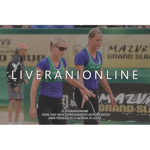 21.08.2014 - Stare Jablonki , siatkowka plazowa , beach volleyball , World Tour , FIVB Stare Jablonki Grand Slam 2014 , Niemcy (zielone) - Polska (czerwone) , Germany - Poland N/Z Karla Borger , Britta Buthe Fot. Mariusz Palczynski / MPAimages.com/NEWSPIX.PL --- Newspix.pl /Agenzia Aldo Liverani sas - ITALY ONLY - Germania - Polonia beach volle femminile, World Tour, FIVB Stare Jablonki Grande Slam 2014 *** Local Caption *** www.newspix.pl mail us: info@newspix.pl call us: 0048 022 23 22 222 --- Polish Picture Agency by Ringier Axel Springer Poland