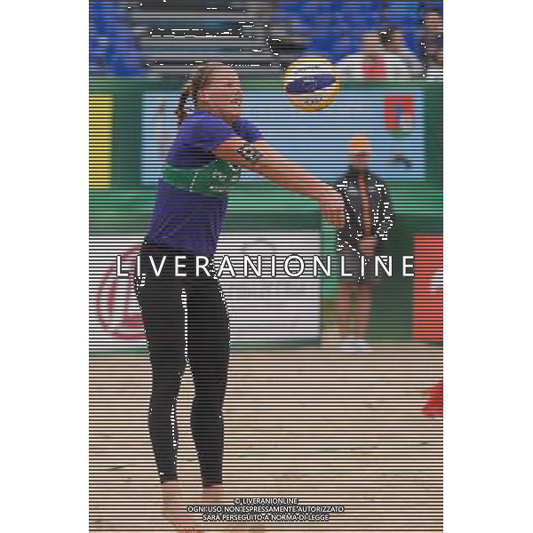 21.08.2014 - Stare Jablonki , siatkowka plazowa , beach volleyball , World Tour , FIVB Stare Jablonki Grand Slam 2014 , Niemcy (zielone) - Polska (czerwone) , Germany - Poland N/Z Britta Buthe Fot. Mariusz Palczynski / MPAimages.com/NEWSPIX.PL --- Newspix.pl /Agenzia Aldo Liverani sas - ITALY ONLY - Germania - Polonia beach volle femminile, World Tour, FIVB Stare Jablonki Grande Slam 2014 *** Local Caption *** www.newspix.pl mail us: info@newspix.pl call us: 0048 022 23 22 222 --- Polish Picture Agency by Ringier Axel Springer Poland