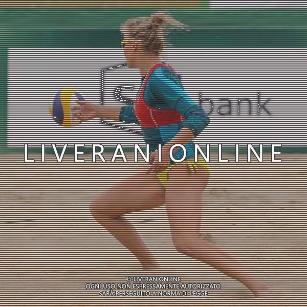 21.08.2014 - Stare Jablonki , siatkowka plazowa , beach volleyball , World Tour , FIVB Stare Jablonki Grand Slam 2014 , Niemcy (zielone) - Polska (czerwone) , Germany - Poland N/Z Jagoda Gruszczynska Fot. Mariusz Palczynski / MPAimages.com/NEWSPIX.PL --- Newspix.pl /Agenzia Aldo Liverani sas - ITALY ONLY - Germania - Polonia beach volle femminile, World Tour, FIVB Stare Jablonki Grande Slam 2014 *** Local Caption *** www.newspix.pl mail us: info@newspix.pl call us: 0048 022 23 22 222 --- Polish Picture Agency by Ringier Axel Springer Poland