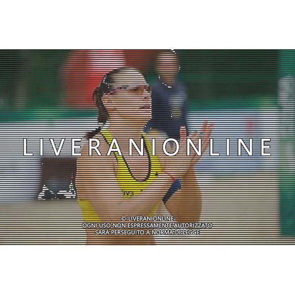 21.08.2014 - Stare Jablonki , siatkowka plazowa , beach volleyball , World Tour , FIVB Stare Jablonki Grand Slam 2014 , Hiszpania (zolte) - Australia (niebieskie) , Spain (yellow) - Australia (blue) N/Z Liliana Fernandez Steiner Fot. Karol Bartnik / MPAimages.com/NEWSPIX.PL --- Newspix.pl /Agenzia Aldo Liverani sas - ITALY ONLY - Australia - Spagna beach volley femminile, World Tour, FIVB Stare Jablonki Grande Slam 2014 *** Local Caption *** www.newspix.pl mail us: info@newspix.pl call us: 0048 022 23 22 222 --- Polish Picture Agency by Ringier Axel Springer Poland