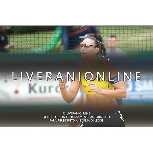 21.08.2014 - Stare Jablonki , siatkowka plazowa , beach volleyball , World Tour , FIVB Stare Jablonki Grand Slam 2014 , Hiszpania (zolte) - Australia (niebieskie) , Spain (yellow) - Australia (blue) N/Z Liliana Fernandez Steiner Fot. Karol Bartnik / MPAimages.com/NEWSPIX.PL --- Newspix.pl /Agenzia Aldo Liverani sas - ITALY ONLY - Australia - Spagna beach volley femminile, World Tour, FIVB Stare Jablonki Grande Slam 2014 *** Local Caption *** www.newspix.pl mail us: info@newspix.pl call us: 0048 022 23 22 222 --- Polish Picture Agency by Ringier Axel Springer Poland