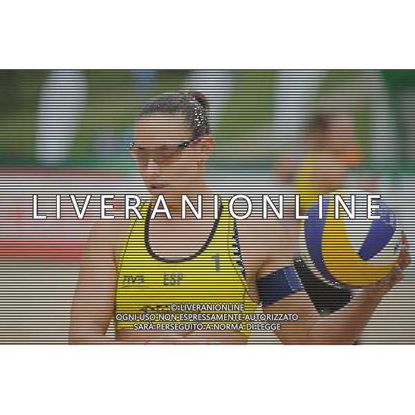 21.08.2014 - Stare Jablonki , siatkowka plazowa , beach volleyball , World Tour , FIVB Stare Jablonki Grand Slam 2014 , Hiszpania (zolte) - Australia (niebieskie) , Spain (yellow) - Australia (blue) N/Z Liliana Fernandez Steiner Fot. Karol Bartnik / MPAimages.com/NEWSPIX.PL --- Newspix.pl /Agenzia Aldo Liverani sas - ITALY ONLY - Australia - Spagna beach volley femminile, World Tour, FIVB Stare Jablonki Grande Slam 2014 *** Local Caption *** www.newspix.pl mail us: info@newspix.pl call us: 0048 022 23 22 222 --- Polish Picture Agency by Ringier Axel Springer Poland
