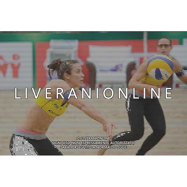 21.08.2014 - Stare Jablonki , siatkowka plazowa , beach volleyball , World Tour , FIVB Stare Jablonki Grand Slam 2014 , Hiszpania (zolte) - Australia (niebieskie) , Spain (yellow) - Australia (blue) N/Z Elsa Baquerizo McMillan Fot. Karol Bartnik / MPAimages.com/NEWSPIX.PL --- Newspix.pl /Agenzia Aldo Liverani sas - ITALY ONLY - Australia - Spagna beach volley femminile, World Tour, FIVB Stare Jablonki Grande Slam 2014 *** Local Caption *** www.newspix.pl mail us: info@newspix.pl call us: 0048 022 23 22 222 --- Polish Picture Agency by Ringier Axel Springer Poland