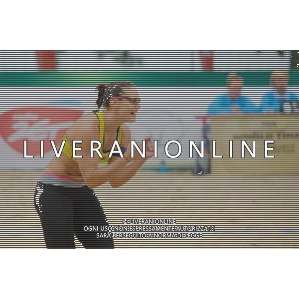 21.08.2014 - Stare Jablonki , siatkowka plazowa , beach volleyball , World Tour , FIVB Stare Jablonki Grand Slam 2014 , Hiszpania (zolte) - Australia (niebieskie) , Spain (yellow) - Australia (blue) N/Z Liliana Fernandez Steiner Fot. Karol Bartnik / MPAimages.com/NEWSPIX.PL --- Newspix.pl /Agenzia Aldo Liverani sas - ITALY ONLY - Australia - Spagna beach volley femminile, World Tour, FIVB Stare Jablonki Grande Slam 2014 *** Local Caption *** www.newspix.pl mail us: info@newspix.pl call us: 0048 022 23 22 222 --- Polish Picture Agency by Ringier Axel Springer Poland
