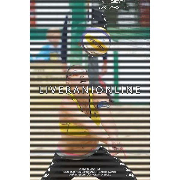 21.08.2014 - Stare Jablonki , siatkowka plazowa , beach volleyball , World Tour , FIVB Stare Jablonki Grand Slam 2014 , Hiszpania (zolte) - Australia (niebieskie) , Spain (yellow) - Australia (blue) N/Z Liliana Fernandez Steiner Fot. Karol Bartnik / MPAimages.com/NEWSPIX.PL --- Newspix.pl /Agenzia Aldo Liverani sas - ITALY ONLY - Australia - Spagna beach volley femminile, World Tour, FIVB Stare Jablonki Grande Slam 2014 *** Local Caption *** www.newspix.pl mail us: info@newspix.pl call us: 0048 022 23 22 222 --- Polish Picture Agency by Ringier Axel Springer Poland