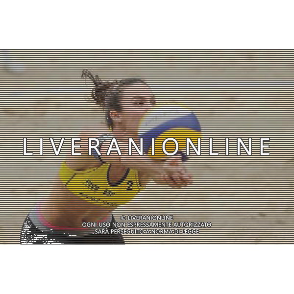 21.08.2014 - Stare Jablonki , siatkowka plazowa , beach volleyball , World Tour , FIVB Stare Jablonki Grand Slam 2014 , Hiszpania (zolte) - Australia (niebieskie) , Spain (yellow) - Australia (blue) N/Z Elsa Baquerizo McMillan Fot. Karol Bartnik / MPAimages.com/NEWSPIX.PL --- Newspix.pl /Agenzia Aldo Liverani sas - ITALY ONLY - Australia - Spagna beach volley femminile, World Tour, FIVB Stare Jablonki Grande Slam 2014 *** Local Caption *** www.newspix.pl mail us: info@newspix.pl call us: 0048 022 23 22 222 --- Polish Picture Agency by Ringier Axel Springer Poland