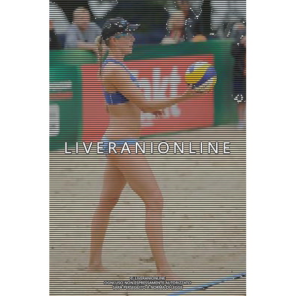 21.08.2014 - Stare Jablonki , siatkowka plazowa , beach volleyball , World Tour , FIVB Stare Jablonki Grand Slam 2014 , Hiszpania (zolte) - Australia (niebieskie) , Spain (yellow) - Australia (blue) N/Z Louise Bawden Fot. Karol Bartnik / MPAimages.com/NEWSPIX.PL --- Newspix.pl /Agenzia Aldo Liverani sas - ITALY ONLY - Australia - Spagna beach volley femminile, World Tour, FIVB Stare Jablonki Grande Slam 2014 *** Local Caption *** www.newspix.pl mail us: info@newspix.pl call us: 0048 022 23 22 222 --- Polish Picture Agency by Ringier Axel Springer Poland