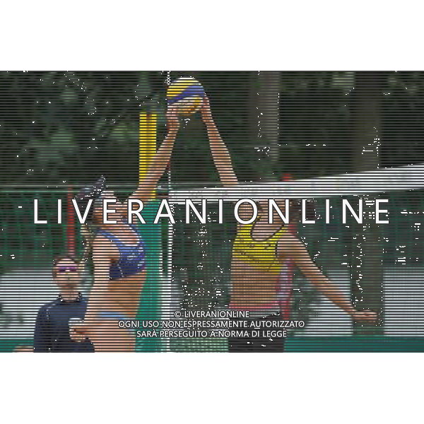21.08.2014 - Stare Jablonki , siatkowka plazowa , beach volleyball , World Tour , FIVB Stare Jablonki Grand Slam 2014 , Hiszpania (zolte) - Australia (niebieskie) , Spain (yellow) - Australia (blue) N/Z Louise Bawden , Elsa Baquerizo McMillan Fot. Karol Bartnik / MPAimages.com/NEWSPIX.PL --- Newspix.pl /Agenzia Aldo Liverani sas - ITALY ONLY - Australia - Spagna beach volley femminile, World Tour, FIVB Stare Jablonki Grande Slam 2014 *** Local Caption *** www.newspix.pl mail us: info@newspix.pl call us: 0048 022 23 22 222 --- Polish Picture Agency by Ringier Axel Springer Poland