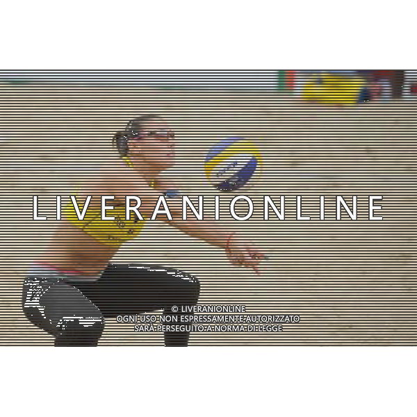 21.08.2014 - Stare Jablonki , siatkowka plazowa , beach volleyball , World Tour , FIVB Stare Jablonki Grand Slam 2014 , Hiszpania (zolte) - Australia (niebieskie) , Spain (yellow) - Australia (blue) N/Z Liliana Fernandez Steiner Fot. Karol Bartnik / MPAimages.com/NEWSPIX.PL --- Newspix.pl /Agenzia Aldo Liverani sas - ITALY ONLY - Australia - Spagna beach volley femminile, World Tour, FIVB Stare Jablonki Grande Slam 2014 *** Local Caption *** www.newspix.pl mail us: info@newspix.pl call us: 0048 022 23 22 222 --- Polish Picture Agency by Ringier Axel Springer Poland