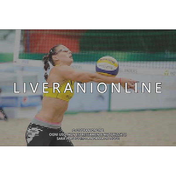 21.08.2014 - Stare Jablonki , siatkowka plazowa , beach volleyball , World Tour , FIVB Stare Jablonki Grand Slam 2014 , Hiszpania (zolte) - Australia (niebieskie) , Spain (yellow) - Australia (blue) N/Z Liliana Fernandez Steiner Fot. Karol Bartnik / MPAimages.com/NEWSPIX.PL --- Newspix.pl /Agenzia Aldo Liverani sas - ITALY ONLY - Australia - Spagna beach volley femminile, World Tour, FIVB Stare Jablonki Grande Slam 2014 *** Local Caption *** www.newspix.pl mail us: info@newspix.pl call us: 0048 022 23 22 222 --- Polish Picture Agency by Ringier Axel Springer Poland