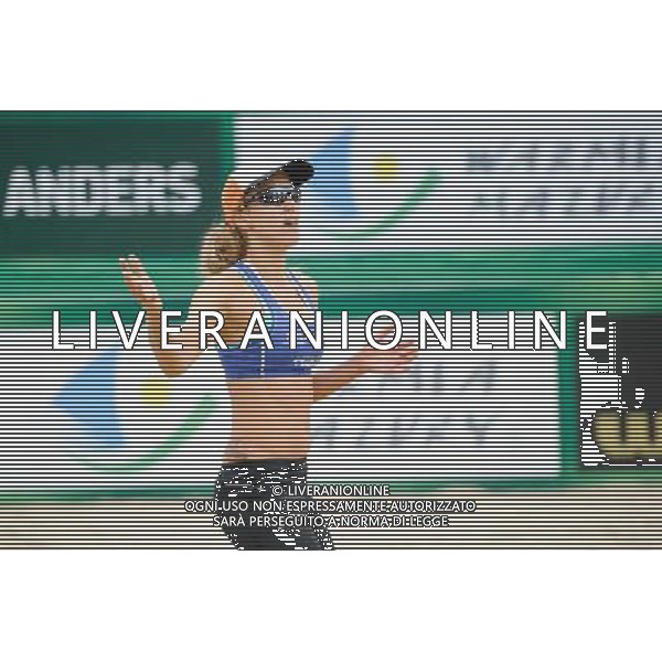 21.08.2014 - Stare Jablonki , siatkowka plazowa , beach volleyball , World Tour , FIVB Stare Jablonki Grand Slam 2014 , Brazylia (biale) - Polskia (niebieskie) , Brazil (white) - Poland (blue) N/Z Monika Brzostek Fot. Karol Bartnik / MPAimages.com/NEWSPIX.PL --- Newspix.pl /Agenzia Aldo Liverani sas - ITALY ONLY - Brasile - Polonia beach volley femminile World Tour, FIVB Stare Jablonki Grande Slam 2014 *** Local Caption *** www.newspix.pl mail us: info@newspix.pl call us: 0048 022 23 22 222 --- Polish Picture Agency by Ringier Axel Springer Poland