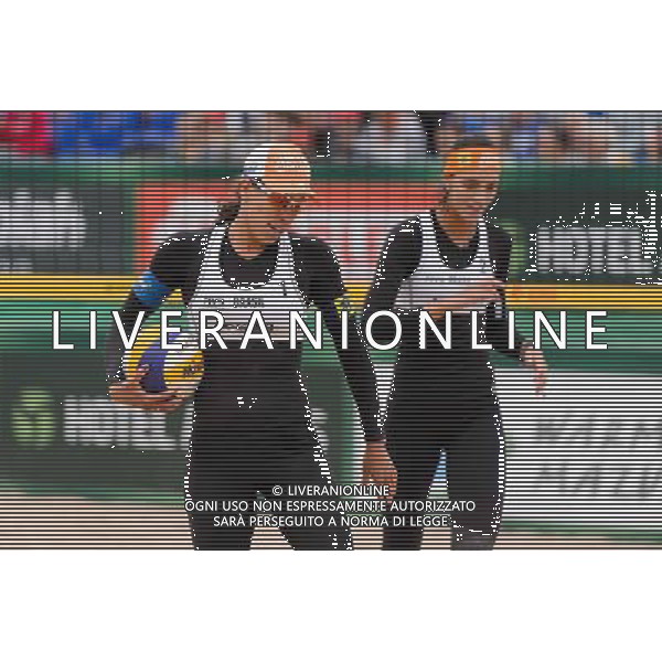 21.08.2014 - Stare Jablonki , siatkowka plazowa , beach volleyball , World Tour , FIVB Stare Jablonki Grand Slam 2014 , Brazylia (biale) - Polska (niebieskie) , Brazil - Poland N/Z Taiana Lima , Fernanda Alves Fot. Mariusz Palczynski / MPAimages.com/NEWSPIX.PL --- Newspix.pl /Agenzia Aldo Liverani sas - ITALY ONLY - Brasile - Polonia beach volley femminile World Tour, FIVB Stare Jablonki Grande Slam 2014 *** Local Caption *** www.newspix.pl mail us: info@newspix.pl call us: 0048 022 23 22 222 --- Polish Picture Agency by Ringier Axel Springer Poland