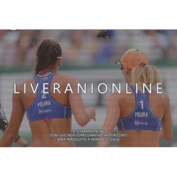 21.08.2014 - Stare Jablonki , siatkowka plazowa , beach volleyball , World Tour , FIVB Stare Jablonki Grand Slam 2014 , Brazylia (biale) - Polska (niebieskie) , Brazil - Poland N/Z Kinga Kolosinska , Monika Brzostek Fot. Mariusz Palczynski / MPAimages.com/NEWSPIX.PL --- Newspix.pl /Agenzia Aldo Liverani sas - ITALY ONLY - Brasile - Polonia beach volley femminile World Tour, FIVB Stare Jablonki Grande Slam 2014 *** Local Caption *** www.newspix.pl mail us: info@newspix.pl call us: 0048 022 23 22 222 --- Polish Picture Agency by Ringier Axel Springer Poland