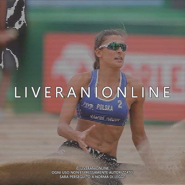 21.08.2014 - Stare Jablonki , siatkowka plazowa , beach volleyball , World Tour , FIVB Stare Jablonki Grand Slam 2014 , Brazylia (biale) - Polska (niebieskie) , Brazil - Poland N/Z Kinga Kolosinska Fot. Mariusz Palczynski / MPAimages.com/NEWSPIX.PL --- Newspix.pl /Agenzia Aldo Liverani sas - ITALY ONLY - Brasile - Polonia beach volley femminile World Tour, FIVB Stare Jablonki Grande Slam 2014 *** Local Caption *** www.newspix.pl mail us: info@newspix.pl call us: 0048 022 23 22 222 --- Polish Picture Agency by Ringier Axel Springer Poland