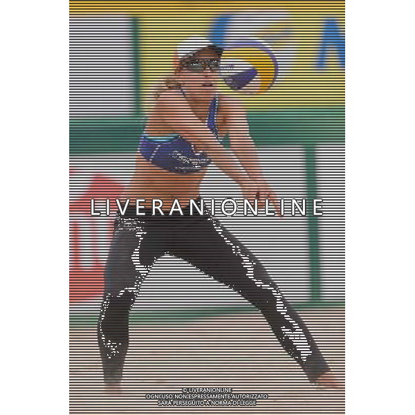 21.08.2014 - Stare Jablonki , siatkowka plazowa , beach volleyball , World Tour , FIVB Stare Jablonki Grand Slam 2014 , Brazylia (biale) - Polska (niebieskie) , Brazil - Poland N/Z Monika Brzostek Fot. Mariusz Palczynski / MPAimages.com/NEWSPIX.PL --- Newspix.pl /Agenzia Aldo Liverani sas - ITALY ONLY - Brasile - Polonia beach volley femminile World Tour, FIVB Stare Jablonki Grande Slam 2014 *** Local Caption *** www.newspix.pl mail us: info@newspix.pl call us: 0048 022 23 22 222 --- Polish Picture Agency by Ringier Axel Springer Poland