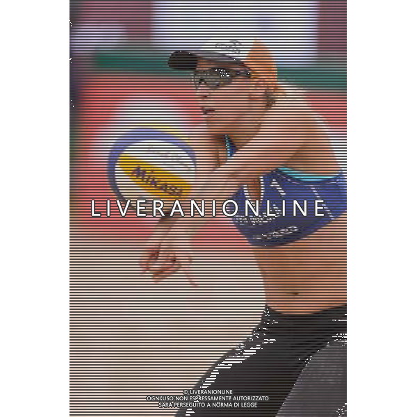 21.08.2014 - Stare Jablonki , siatkowka plazowa , beach volleyball , World Tour , FIVB Stare Jablonki Grand Slam 2014 , Brazylia (biale) - Polska (niebieskie) , Brazil - Poland N/Z Monika Brzostek Fot. Mariusz Palczynski / MPAimages.com/NEWSPIX.PL --- Newspix.pl /Agenzia Aldo Liverani sas - ITALY ONLY - Brasile - Polonia beach volley femminile World Tour, FIVB Stare Jablonki Grande Slam 2014 *** Local Caption *** www.newspix.pl mail us: info@newspix.pl call us: 0048 022 23 22 222 --- Polish Picture Agency by Ringier Axel Springer Poland