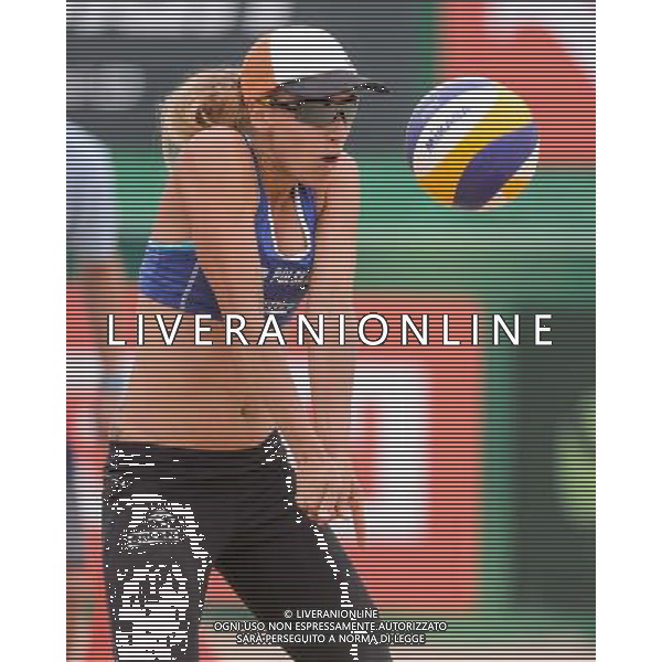 21.08.2014 - Stare Jablonki , siatkowka plazowa , beach volleyball , World Tour , FIVB Stare Jablonki Grand Slam 2014 , Brazylia (biale) - Polska (niebieskie) , Brazil - Poland N/Z Monika Brzostek Fot. Mariusz Palczynski / MPAimages.com/NEWSPIX.PL --- Newspix.pl /Agenzia Aldo Liverani sas - ITALY ONLY - Brasile - Polonia beach volley femminile World Tour, FIVB Stare Jablonki Grande Slam 2014 *** Local Caption *** www.newspix.pl mail us: info@newspix.pl call us: 0048 022 23 22 222 --- Polish Picture Agency by Ringier Axel Springer Poland