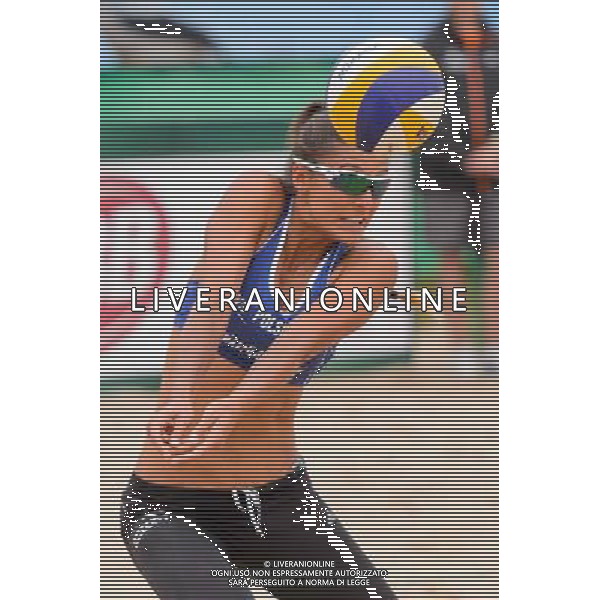 21.08.2014 - Stare Jablonki , siatkowka plazowa , beach volleyball , World Tour , FIVB Stare Jablonki Grand Slam 2014 , Brazylia (biale) - Polska (niebieskie) , Brazil - Poland N/Z Kinga Kolosinska Fot. Mariusz Palczynski / MPAimages.com/NEWSPIX.PL --- Newspix.pl /Agenzia Aldo Liverani sas - ITALY ONLY - Brasile - Polonia beach volley femminile World Tour, FIVB Stare Jablonki Grande Slam 2014 *** Local Caption *** www.newspix.pl mail us: info@newspix.pl call us: 0048 022 23 22 222 --- Polish Picture Agency by Ringier Axel Springer Poland