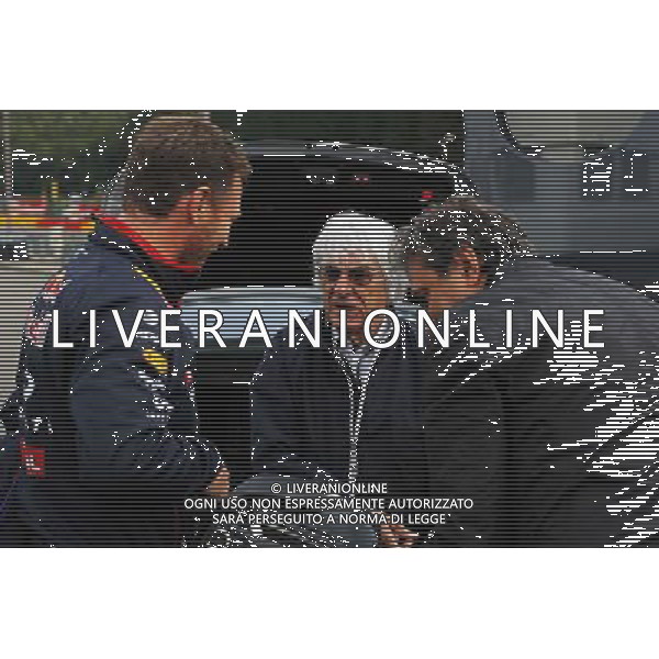 (L to R): Christian Horner (GBR) Red Bull Racing Team Principal with Bernie Ecclestone (GBR) and Pasquale Lattuneddu (ITA) of the FOM. 22.08.2014. Formula 1 World Championship, Rd 12, Belgian Grand Prix, Spa Francorchamps, Belgium, Practice Day. AG ALDO LIVERANI SAS ONLY ITALY