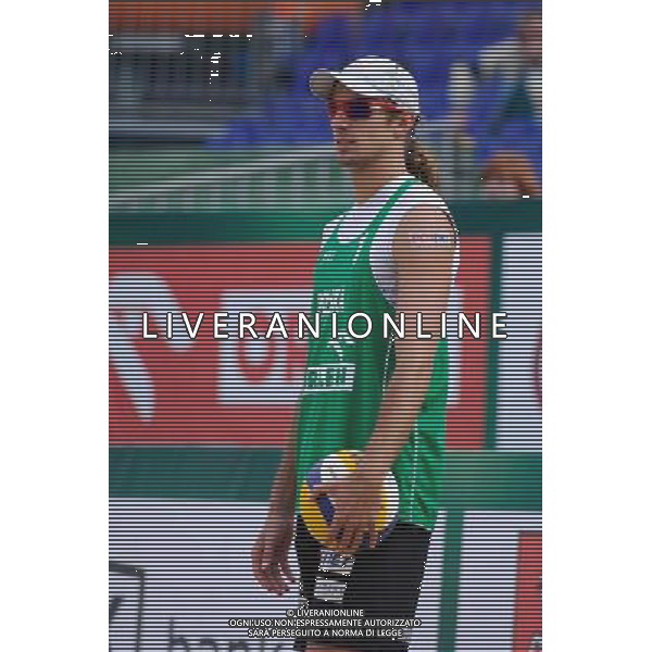 21.08.2014 - Stare Jablonki , siatkowka plazowa , beach volleyball , World Tour , FIVB Stare Jablonki Grand Slam 2014 , Polska (zielone) - Rosja (niebieskie) , Poland (green) - Russia (blue) N/Z Mariusz Prudel Fot. Karol Bartnik / MPAimages.com/NEWSPIX.PL --- Newspix.pl /Agenzia Aldo Liverani sas - ITALY ONLY - Polonia - Russia beach volley maschile, World Tour, FIVB Stare Jablonki Grande Slam 2014 *** Local Caption *** www.newspix.pl mail us: info@newspix.pl call us: 0048 022 23 22 222 --- Polish Picture Agency by Ringier Axel Springer Poland