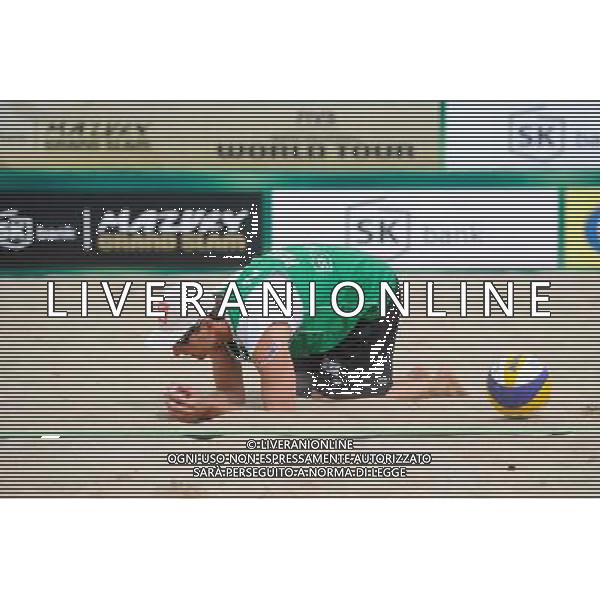 21.08.2014 - Stare Jablonki , siatkowka plazowa , beach volleyball , World Tour , FIVB Stare Jablonki Grand Slam 2014 , Polska (zielone) - Rosja (niebieskie) , Poland (green) - Russia (blue) N/Z Grzegorz Fijalek Fot. Karol Bartnik / MPAimages.com/NEWSPIX.PL --- Newspix.pl /Agenzia Aldo Liverani sas - ITALY ONLY - Polonia - Russia beach volley maschile, World Tour, FIVB Stare Jablonki Grande Slam 2014 *** Local Caption *** www.newspix.pl mail us: info@newspix.pl call us: 0048 022 23 22 222 --- Polish Picture Agency by Ringier Axel Springer Poland