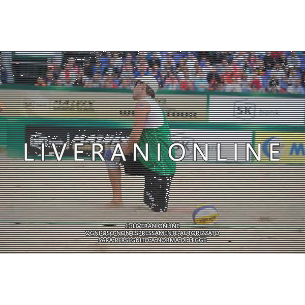 21.08.2014 - Stare Jablonki , siatkowka plazowa , beach volleyball , World Tour , FIVB Stare Jablonki Grand Slam 2014 , Polska (zielone) - Rosja (niebieskie) , Poland (green) - Russia (blue) N/Z Grzegorz Fijalek Fot. Karol Bartnik / MPAimages.com/NEWSPIX.PL --- Newspix.pl /Agenzia Aldo Liverani sas - ITALY ONLY - Polonia - Russia beach volley maschile, World Tour, FIVB Stare Jablonki Grande Slam 2014 *** Local Caption *** www.newspix.pl mail us: info@newspix.pl call us: 0048 022 23 22 222 --- Polish Picture Agency by Ringier Axel Springer Poland