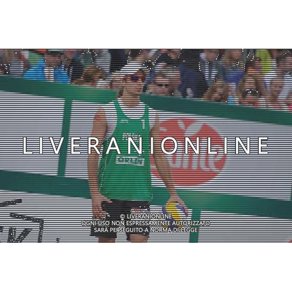 21.08.2014 - Stare Jablonki , siatkowka plazowa , beach volleyball , World Tour , FIVB Stare Jablonki Grand Slam 2014 , Polska (zielone) - Rosja (niebieskie) , Poland (green) - Russia (blue) N/Z Mariusz Prudel Fot. Karol Bartnik / MPAimages.com/NEWSPIX.PL --- Newspix.pl /Agenzia Aldo Liverani sas - ITALY ONLY - Polonia - Russia beach volley maschile, World Tour, FIVB Stare Jablonki Grande Slam 2014 *** Local Caption *** www.newspix.pl mail us: info@newspix.pl call us: 0048 022 23 22 222 --- Polish Picture Agency by Ringier Axel Springer Poland