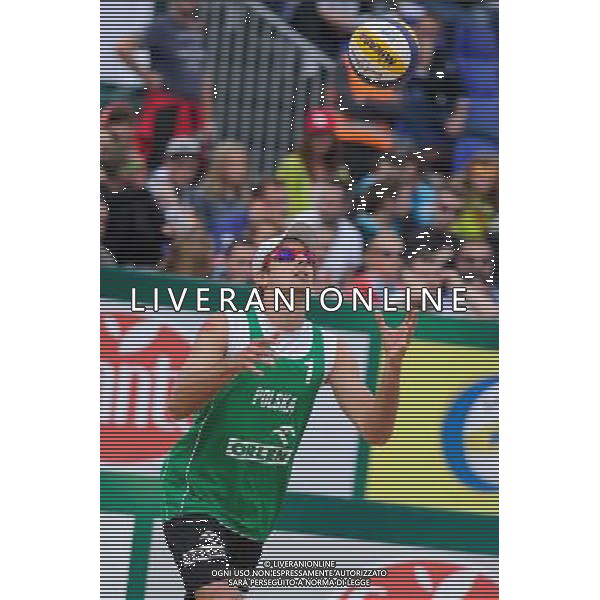21.08.2014 - Stare Jablonki , siatkowka plazowa , beach volleyball , World Tour , FIVB Stare Jablonki Grand Slam 2014 , Polska (zielone) - Rosja (niebieskie) , Poland (green) - Russia (blue) N/Z Mariusz Prudel Fot. Karol Bartnik / MPAimages.com/NEWSPIX.PL --- Newspix.pl /Agenzia Aldo Liverani sas - ITALY ONLY - Polonia - Russia beach volley maschile, World Tour, FIVB Stare Jablonki Grande Slam 2014 *** Local Caption *** www.newspix.pl mail us: info@newspix.pl call us: 0048 022 23 22 222 --- Polish Picture Agency by Ringier Axel Springer Poland