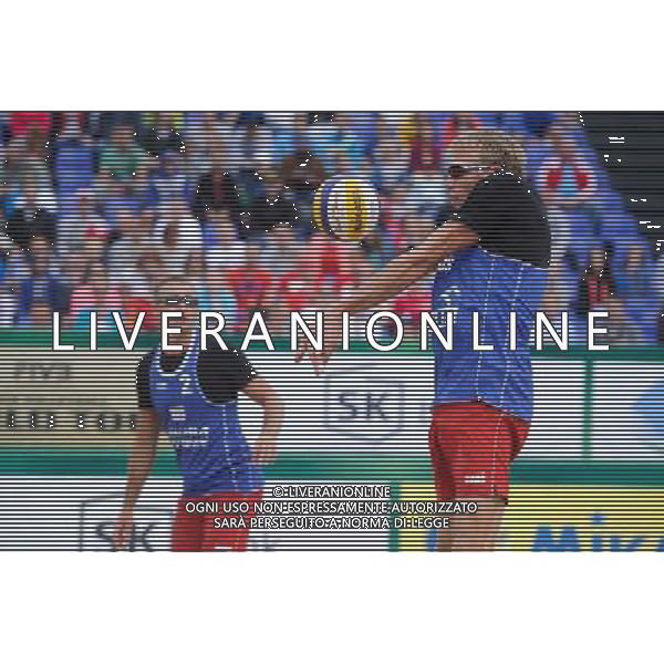 21.08.2014 - Stare Jablonki , siatkowka plazowa , beach volleyball , World Tour , FIVB Stare Jablonki Grand Slam 2014 , Polska (zielone) - Rosja (niebieskie) , Poland (green) - Russia (blue) N/Z Dmitri Barsouk Fot. Karol Bartnik / MPAimages.com/NEWSPIX.PL --- Newspix.pl /Agenzia Aldo Liverani sas - ITALY ONLY - Polonia - Russia beach volley maschile, World Tour, FIVB Stare Jablonki Grande Slam 2014 *** Local Caption *** www.newspix.pl mail us: info@newspix.pl call us: 0048 022 23 22 222 --- Polish Picture Agency by Ringier Axel Springer Poland