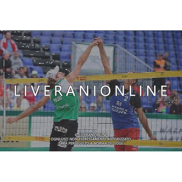 21.08.2014 - Stare Jablonki , siatkowka plazowa , beach volleyball , World Tour , FIVB Stare Jablonki Grand Slam 2014 , Polska (zielone) - Rosja (niebieskie) , Poland (green) - Russia (blue) N/Z Mariusz Prudel , Nikita Liamin Fot. Karol Bartnik / MPAimages.com/NEWSPIX.PL --- Newspix.pl /Agenzia Aldo Liverani sas - ITALY ONLY - Polonia - Russia beach volley maschile, World Tour, FIVB Stare Jablonki Grande Slam 2014 *** Local Caption *** www.newspix.pl mail us: info@newspix.pl call us: 0048 022 23 22 222 --- Polish Picture Agency by Ringier Axel Springer Poland