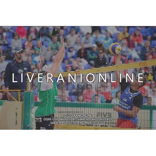 21.08.2014 - Stare Jablonki , siatkowka plazowa , beach volleyball , World Tour , FIVB Stare Jablonki Grand Slam 2014 , Polska (zielone) - Rosja (niebieskie) , Poland (green) - Russia (blue) N/Z Mariusz Prudel , Nikita Liamin Fot. Karol Bartnik / MPAimages.com/NEWSPIX.PL --- Newspix.pl /Agenzia Aldo Liverani sas - ITALY ONLY - Polonia - Russia beach volley maschile, World Tour, FIVB Stare Jablonki Grande Slam 2014 *** Local Caption *** www.newspix.pl mail us: info@newspix.pl call us: 0048 022 23 22 222 --- Polish Picture Agency by Ringier Axel Springer Poland