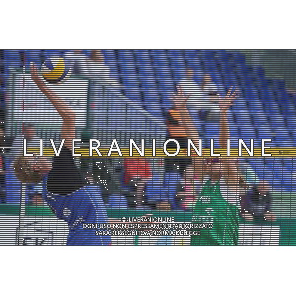 21.08.2014 - Stare Jablonki , siatkowka plazowa , beach volleyball , World Tour , FIVB Stare Jablonki Grand Slam 2014 , Polska (zielone) - Rosja (niebieskie) , Poland (green) - Russia (blue) N/Z Dmitri Barsouk , Mariusz Prudel Fot. Karol Bartnik / MPAimages.com/NEWSPIX.PL --- Newspix.pl /Agenzia Aldo Liverani sas - ITALY ONLY - Polonia - Russia beach volley maschile, World Tour, FIVB Stare Jablonki Grande Slam 2014 *** Local Caption *** www.newspix.pl mail us: info@newspix.pl call us: 0048 022 23 22 222 --- Polish Picture Agency by Ringier Axel Springer Poland