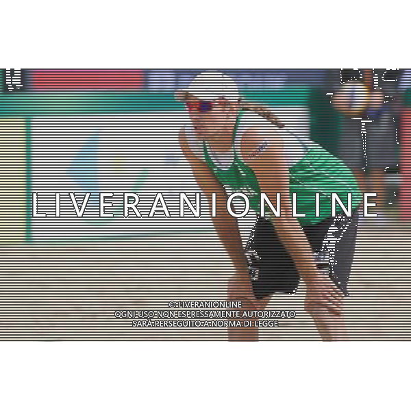 21.08.2014 - Stare Jablonki , siatkowka plazowa , beach volleyball , World Tour , FIVB Stare Jablonki Grand Slam 2014 , Polska (zielone) - Rosja (niebieskie) , Poland (green) - Russia (blue) N/Z Mariusz Prudel Fot. Karol Bartnik / MPAimages.com/NEWSPIX.PL --- Newspix.pl /Agenzia Aldo Liverani sas - ITALY ONLY - Polonia - Russia beach volley maschile, World Tour, FIVB Stare Jablonki Grande Slam 2014 *** Local Caption *** www.newspix.pl mail us: info@newspix.pl call us: 0048 022 23 22 222 --- Polish Picture Agency by Ringier Axel Springer Poland