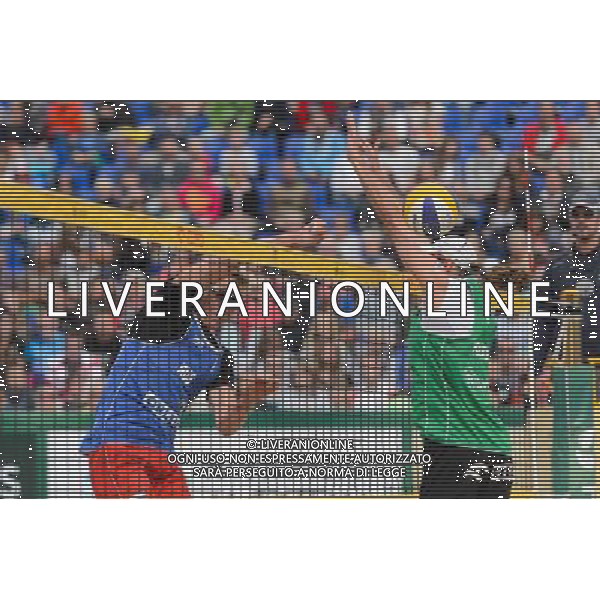 21.08.2014 - Stare Jablonki , siatkowka plazowa , beach volleyball , World Tour , FIVB Stare Jablonki Grand Slam 2014 , Polska (zielone) - Rosja (niebieskie) , Poland - Russia N/Z Dmitri Barsouk , Mariusz Prudel Fot. Mariusz Palczynski / MPAimages.com/NEWSPIX.PL --- Newspix.pl /Agenzia Aldo Liverani sas - ITALY ONLY - Polonia - Russia beach volley maschile, World Tour, FIVB Stare Jablonki Grande Slam 2014 *** Local Caption *** www.newspix.pl mail us: info@newspix.pl call us: 0048 022 23 22 222 --- Polish Picture Agency by Ringier Axel Springer Poland