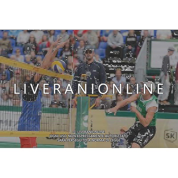 21.08.2014 - Stare Jablonki , siatkowka plazowa , beach volleyball , World Tour , FIVB Stare Jablonki Grand Slam 2014 , Polska (zielone) - Rosja (niebieskie) , Poland - Russia N/Z Dmitri Barsouk , Grzegorz Fijalek Fot. Mariusz Palczynski / MPAimages.com/NEWSPIX.PL --- Newspix.pl /Agenzia Aldo Liverani sas - ITALY ONLY - Polonia - Russia beach volley maschile, World Tour, FIVB Stare Jablonki Grande Slam 2014 *** Local Caption *** www.newspix.pl mail us: info@newspix.pl call us: 0048 022 23 22 222 --- Polish Picture Agency by Ringier Axel Springer Poland