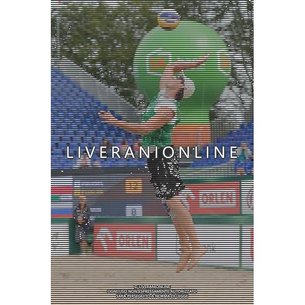 21.08.2014 - Stare Jablonki , siatkowka plazowa , beach volleyball , World Tour , FIVB Stare Jablonki Grand Slam 2014 , Polska (zielone) - Rosja (niebieskie) , Poland - Russia N/Z Grzegorz Fijalek Fot. Mariusz Palczynski / MPAimages.com/NEWSPIX.PL --- Newspix.pl /Agenzia Aldo Liverani sas - ITALY ONLY - Polonia - Russia beach volley maschile, World Tour, FIVB Stare Jablonki Grande Slam 2014 *** Local Caption *** www.newspix.pl mail us: info@newspix.pl call us: 0048 022 23 22 222 --- Polish Picture Agency by Ringier Axel Springer Poland
