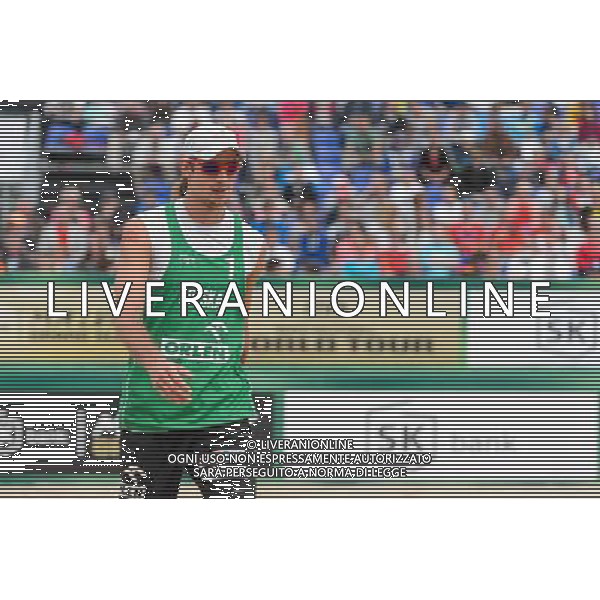 21.08.2014 - Stare Jablonki , siatkowka plazowa , beach volleyball , World Tour , FIVB Stare Jablonki Grand Slam 2014 , Polska (zielone) - Rosja (niebieskie) , Poland - Russia N/Z Mariusz Prudel Fot. Mariusz Palczynski / MPAimages.com/NEWSPIX.PL --- Newspix.pl /Agenzia Aldo Liverani sas - ITALY ONLY - Polonia - Russia beach volley maschile, World Tour, FIVB Stare Jablonki Grande Slam 2014 *** Local Caption *** www.newspix.pl mail us: info@newspix.pl call us: 0048 022 23 22 222 --- Polish Picture Agency by Ringier Axel Springer Poland