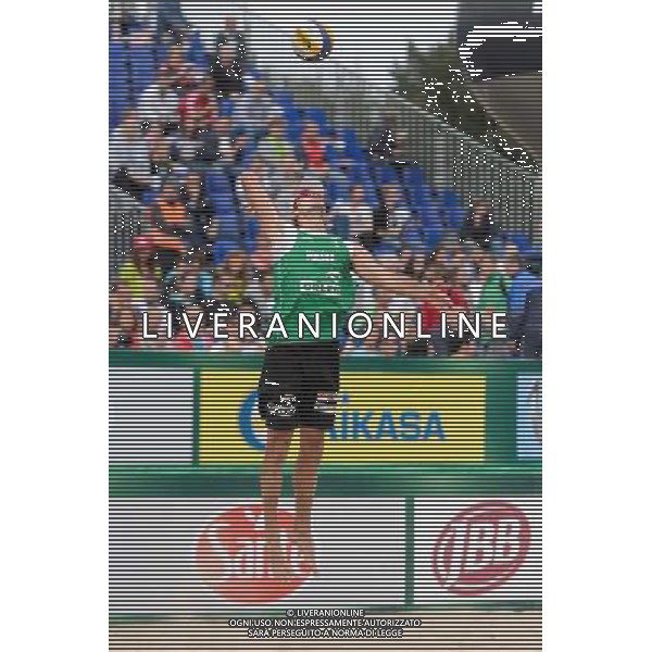 21.08.2014 - Stare Jablonki , siatkowka plazowa , beach volleyball , World Tour , FIVB Stare Jablonki Grand Slam 2014 , Polska (zielone) - Rosja (niebieskie) , Poland - Russia N/Z Mariusz Prudel Fot. Mariusz Palczynski / MPAimages.com/NEWSPIX.PL --- Newspix.pl /Agenzia Aldo Liverani sas - ITALY ONLY - Polonia - Russia beach volley maschile, World Tour, FIVB Stare Jablonki Grande Slam 2014 *** Local Caption *** www.newspix.pl mail us: info@newspix.pl call us: 0048 022 23 22 222 --- Polish Picture Agency by Ringier Axel Springer Poland