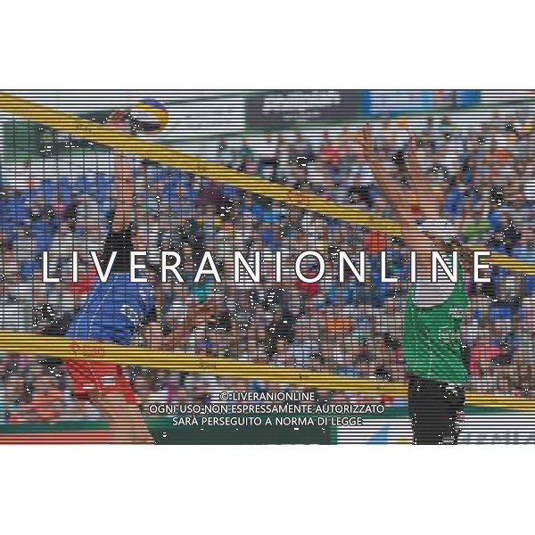 21.08.2014 - Stare Jablonki , siatkowka plazowa , beach volleyball , World Tour , FIVB Stare Jablonki Grand Slam 2014 , Polska (zielone) - Rosja (niebieskie) , Poland - Russia N/Z Dmitri Barsouk , Mariusz Prudel Fot. Mariusz Palczynski / MPAimages.com/NEWSPIX.PL --- Newspix.pl /Agenzia Aldo Liverani sas - ITALY ONLY - Polonia - Russia beach volley maschile, World Tour, FIVB Stare Jablonki Grande Slam 2014 *** Local Caption *** www.newspix.pl mail us: info@newspix.pl call us: 0048 022 23 22 222 --- Polish Picture Agency by Ringier Axel Springer Poland