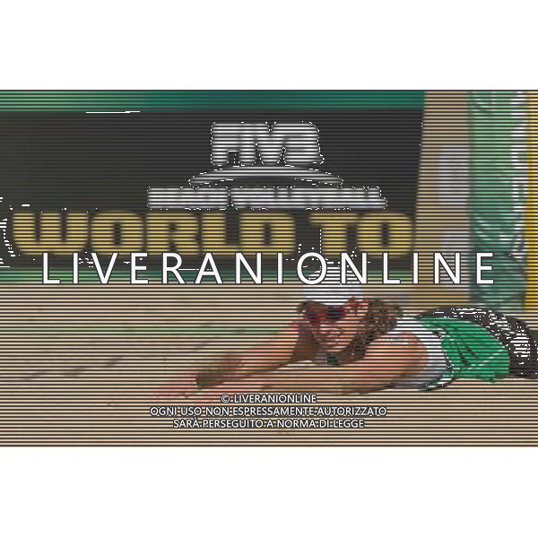 21.08.2014 - Stare Jablonki , siatkowka plazowa , beach volleyball , World Tour , FIVB Stare Jablonki Grand Slam 2014 , Polska (zielone) - Rosja (niebieskie) , Poland - Russia N/Z Mariusz Prudel Fot. Mariusz Palczynski / MPAimages.com/NEWSPIX.PL --- Newspix.pl /Agenzia Aldo Liverani sas - ITALY ONLY - Polonia - Russia beach volley maschile, World Tour, FIVB Stare Jablonki Grande Slam 2014 *** Local Caption *** www.newspix.pl mail us: info@newspix.pl call us: 0048 022 23 22 222 --- Polish Picture Agency by Ringier Axel Springer Poland