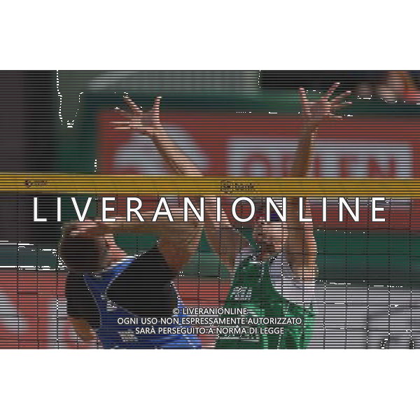 21.08.2014 - Stare Jablonki , siatkowka plazowa , beach volleyball , World Tour , FIVB Stare Jablonki Grand Slam 2014 , Polska (zielone) - Rosja (niebieskie) , Poland - Russia N/Z Nikita Liamin , Mariusz Prudel Fot. Mariusz Palczynski / MPAimages.com/NEWSPIX.PL --- Newspix.pl /Agenzia Aldo Liverani sas - ITALY ONLY - Polonia - Russia beach volley maschile, World Tour, FIVB Stare Jablonki Grande Slam 2014 *** Local Caption *** www.newspix.pl mail us: info@newspix.pl call us: 0048 022 23 22 222 --- Polish Picture Agency by Ringier Axel Springer Poland